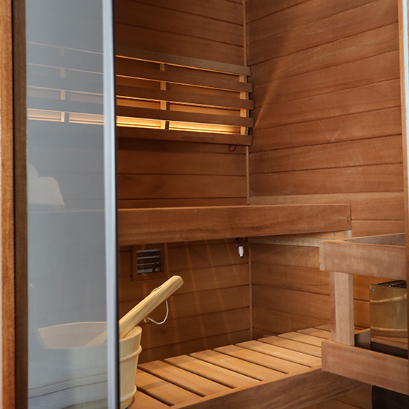 Samsora 701VT steam sauna detail features - close-up showcase of African mahogany craftsmanship, glass door assembly, hardware components and interior finishing elements