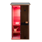 Samsora 701VT steam sauna frontal view - compact mahogany construction featuring transparent entrance, refined metallic fixtures and elegant design aesthetic