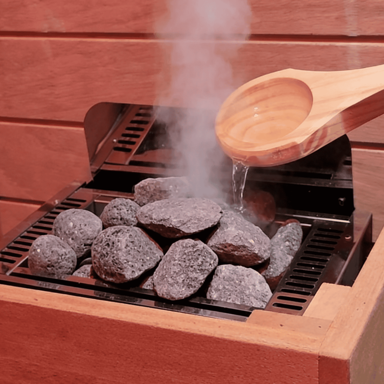 Samsora steam sauna heating stones in action - premium sauna rocks generating therapeutic steam for optimal wellness experience